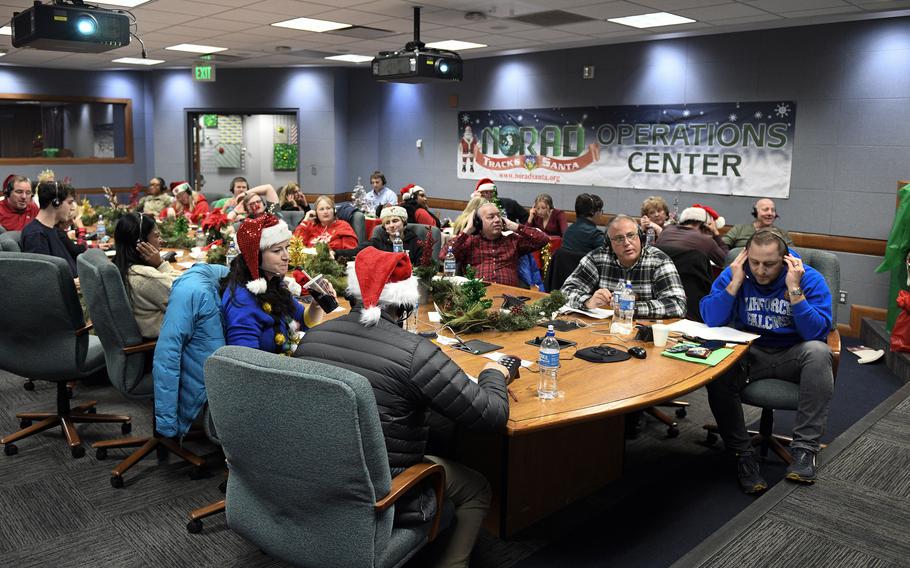 Volunteers at the NORAD Tracks Santa Operations Center