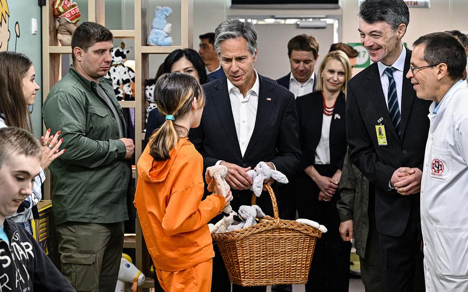 U.S. Secretary of State Antony Blinken meets children during his visit to a children’s hospital in Kyiv on Sept. 8, 2022.