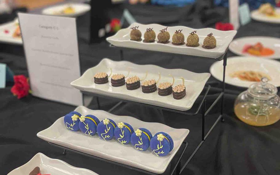 Sgt. Kylie De La Rouche made pistachio truffles, chocolate Nutella cake, lemon-blueberry macarons and chocolate strawberry butterflies at the 48th Joint Culinary Training Exercise in the MacLaughlin Fitness Center on Fort Gregg-Adams, Va., on March 8, 2024.