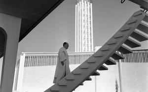 Royal Oaks, Madrid, Spain, March 1961:  Father Santos Galinda climbs a stairway in the general direction of heaven in the courtyard of the new Church of St. Peter the Martyr, overlooking the U.S. Air Force's Royal Oaks housing area near Madrid.

Did you serve in Europe in 1961? Subscribe to Stars and Stripes’ historic newspaper archive! We have digitized our 1948-1999 European and Pacific editions, as well as several of our WWII editions and made them available online through http://starsandstripes.newspaperarchive.com/

META TAGS: Europe; Spain; church; religion; chaplain; Catholicism; architecture; U.S. Air Force; military housing; 