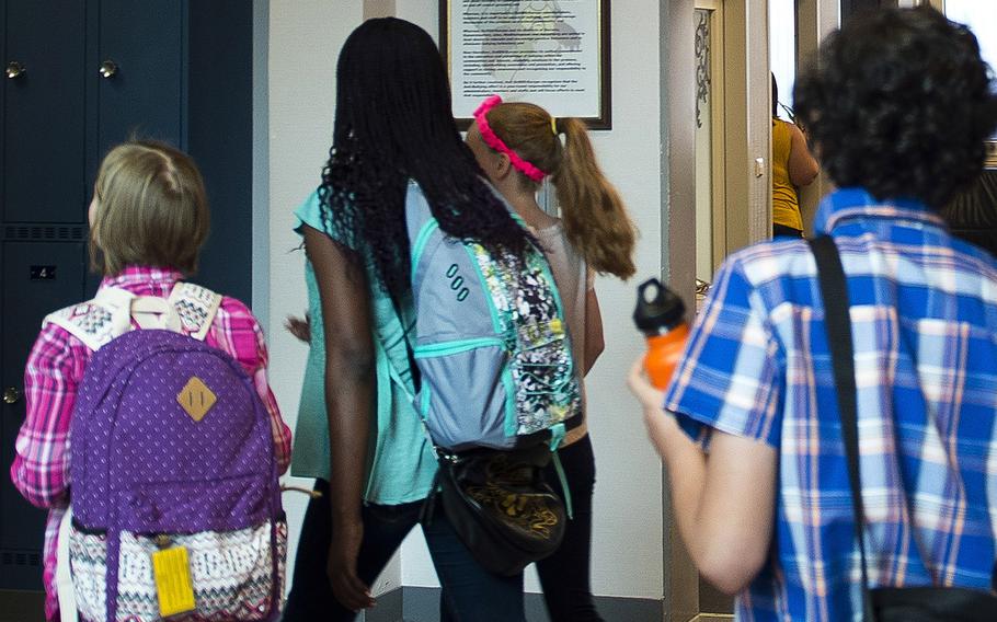 Students move between classes during the first day of school at a Department of Defense Education Activity school in 2017. Civilian dependents who are sexually victimized by fellow students at Defense Department schools can’t get mental health treatment and other needed services through the military, according to a Government Accountability Office report released Feb. 13, 2024.