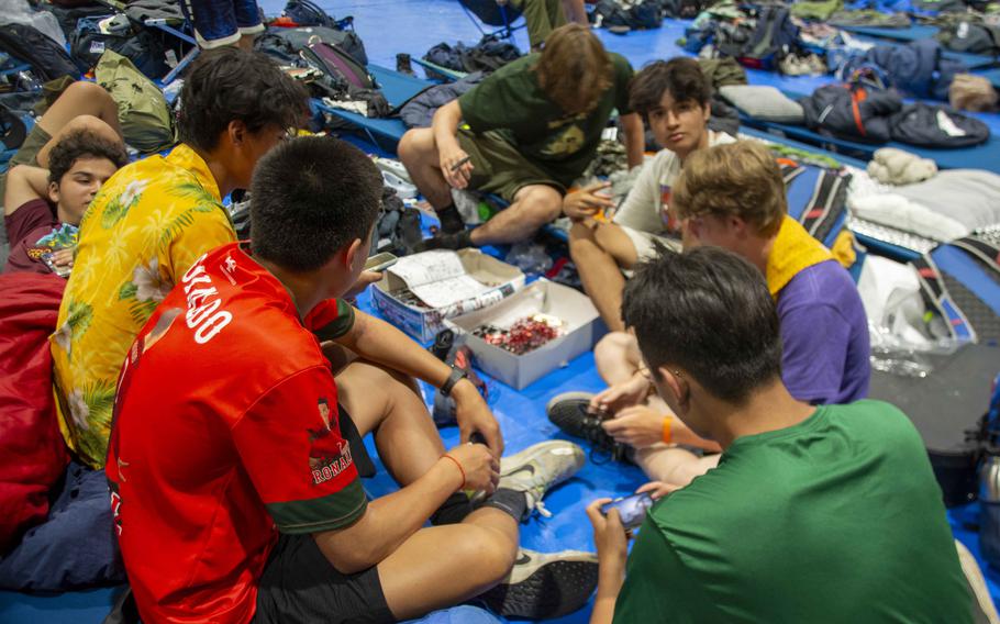 Boy Scouts spent Tuesday evening down time at the Humphreys Middle School gym at Camp Humphreys, South Korea, Aug. 8, 2023. 