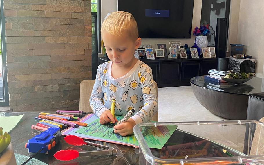 Hudson Byrnes, 4, crafting cards for rescue workers at his home in Plantation, Fla., about 20 miles from Champlain Towers South. 