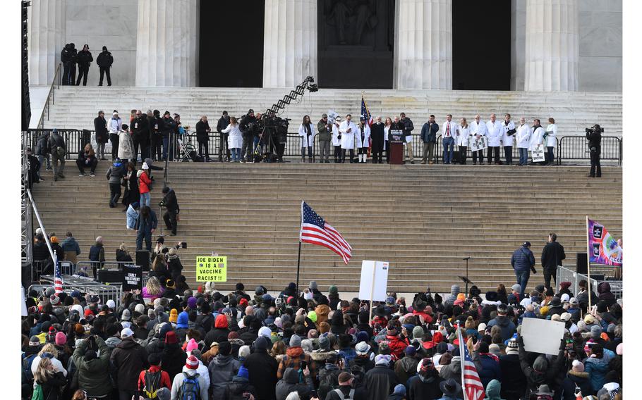 Speakers stand on the steps of the Lincoln Memorial for the “Defeat the Mandates: An American Homecoming” rally on Sunday, Jan. 23, 2022, in Washington, D.C. Protesters were voicing their disagreement with vaccine mandates. 