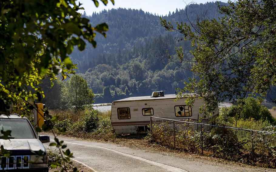 A rundown motor home sits above the Klamath River at the far corner of the Yurok Reservation called End of Road, on Oct. 5, 2022, in Pecwan, California. It is near where Emmilee Risling was last seen before she disappeared in October of 2021 on a rural Native American reservation in Humboldt County. 