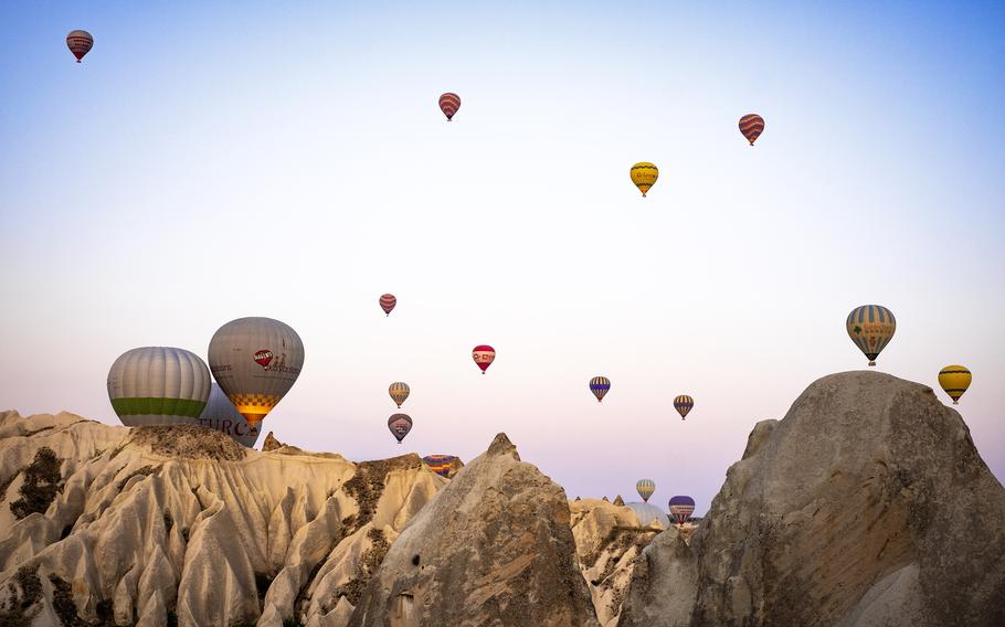 More than 100 hot air balloons soar 1,500 feet above Rose Valley. 