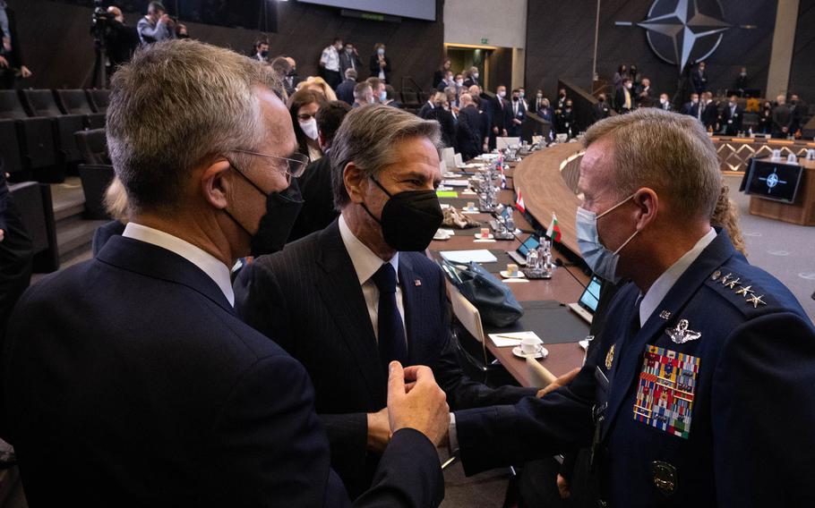 NATO Secretary-General Jens Stoltenberg with Secretary of State Antony J. Blinken and Air Force Gen. Tod Wolters, Supreme Allied Commander Europe, from left, talk before the before a meeting of foreign ministers at NATO headquarters in Brussels, March 4, 2022.