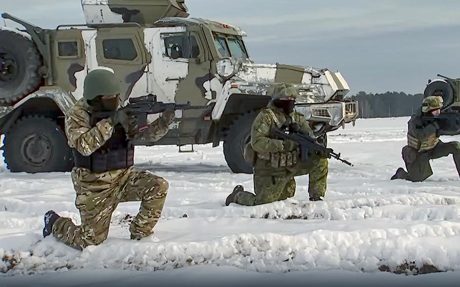 Russian troops take part in drills at an unspecified location in Belarus, Dec. 28, 2022. 