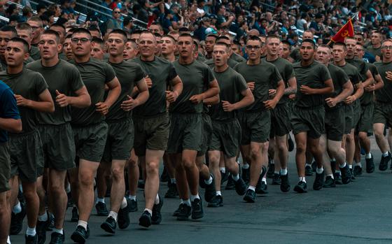New U.S. Marines with Kilo Company, 3rd Recruit Training Battalion, conduct a motivational run at Marine Corps Recruit Depot (MCRD) San Diego, Aug. 31, 2023. The motivational run is the last physical training exercise Marines conduct while at MCRD. (U.S. Marine Corps photo by Cpl. Alexander O. Devereux)
