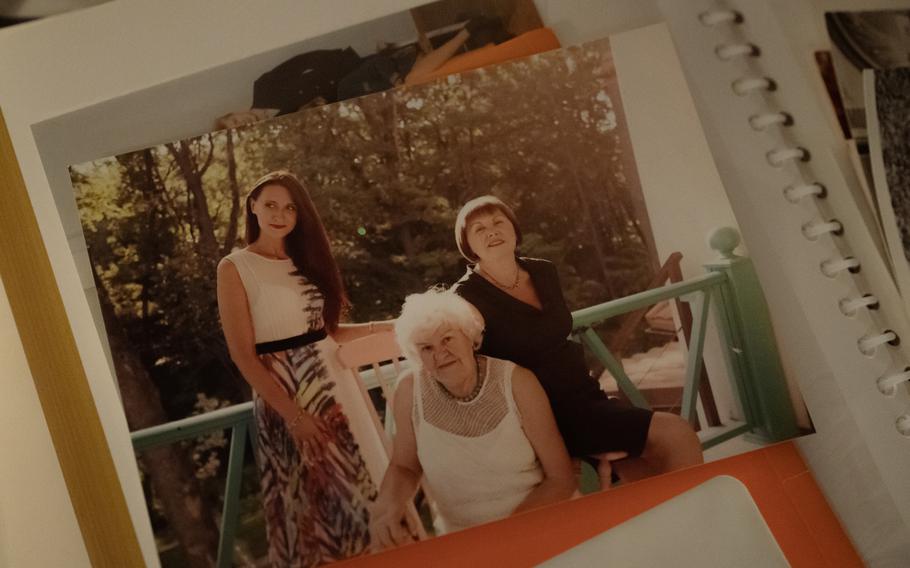 An undated photo of Kateryna Tulio, her grandmother Nina Kniazieva and her mother, Iryna Pyenska, in an album of photographs carried by Iryna Pyenska from Ukraine. 