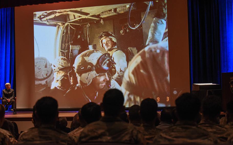 Current U.S. Army Rangers look at photos of 3rd Battalion, 75th Ranger Regiment Rangers in action in Somalia in 1993 before 18 former members of the unit were awarded Silver Stars for their actions in the infamous Battle of Mogadishu that year.