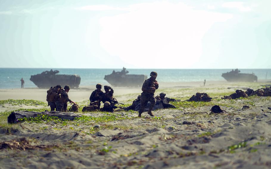 U.S. and Philippine marines and sailors conduct an amphibious landing during Balikatan training in the province of Cagayan, Philippines, March 31, 2022. 