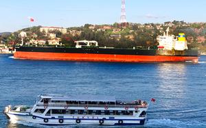 The Greek-flagged oil tanker Prudent Warrior, background, is seen as it sails past Istanbul, Turkey, April 19, 2019. Iran's paramilitary Revolutionary Guard seized two Greek oil tankers on Friday, May 27, 2022, in helicopter-launched raids in the Persian Gulf, according to officials. The actions were an apparent retaliation for Athens assisting the U.S. in seizing Iranian crude oil in the Mediterranean Sea over violating Washington's crushing sanctions on the Islamic Republic. (Dursun Çam via AP)