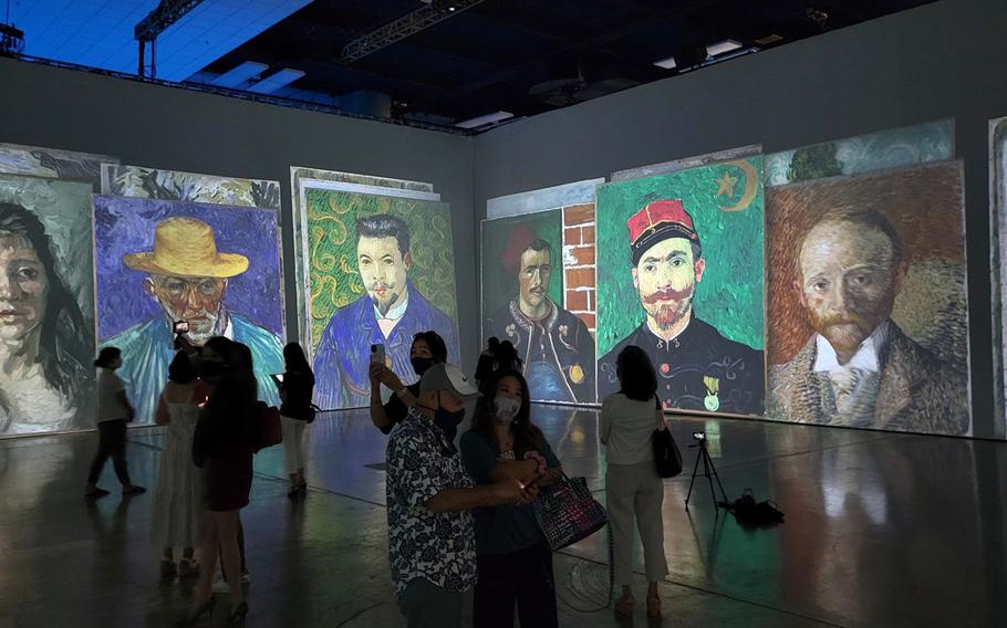 An assemblage of portraits of friends and acquaintances by Vincent Van Gogh are displayed at Beyond Van Gogh: The Immersive Experience, running through Sept. 26, 2021, at the Honolulu Convention Center.