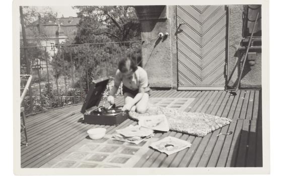 Felice Schragenheim with a record player on a terrace in Berlin in 1934. MUST CREDIT: Jewish Museum Berlin; gift of Elisabeth Wust
