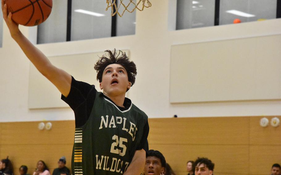 Naples’ Jettyn Jones goes up for a basket Wednesday, Feb. 14, 2024, in the Wildcats’ victory over Marymount on the opening day of the DODEA European Division II Basketball Championships in Wiesbaden, Germany.