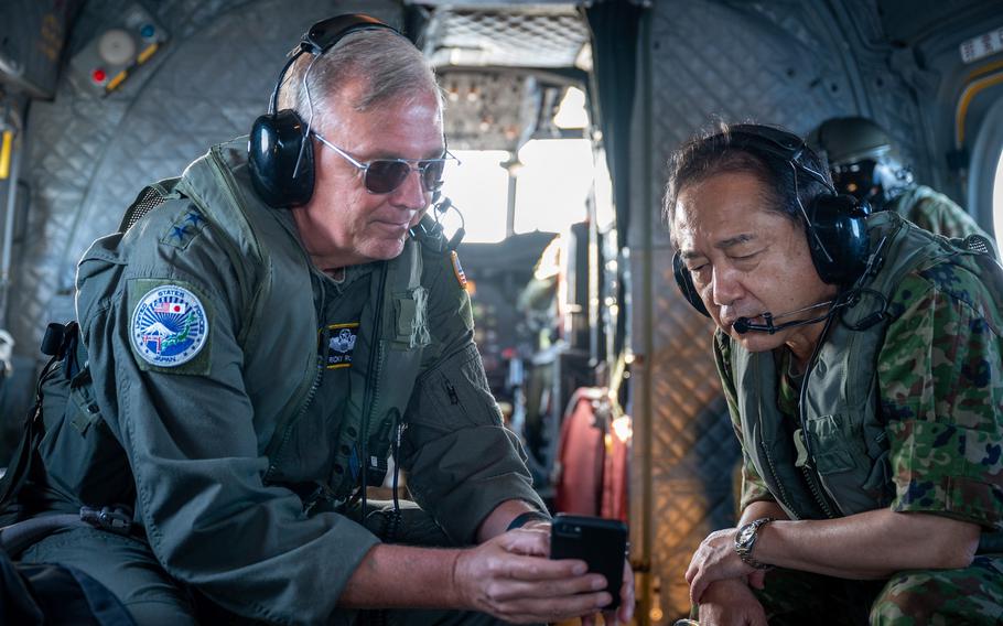 Japan Joint Staff Chief of Staff Gen. Yamazaki Koji, right, and Air Force Lt. Gen. Ricky Rupp, commander of U.S. Forces Japan, visited the helicopter carrier JS Izumo on Nov. 14, 2020.