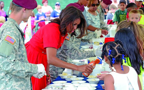 Hed: Sweetening up military life, 2015

Vicenza, Italy, June 19, 2015: First lady Michelle Obama serves ice cream to children of servicemembers during an event in support of military families, offering up some caramel sauce as a topping. 

Did you know July is National Ice Cream month? So go ahead and sweeten up your life a bit with a scoop or two! And add some caramel sauce (and sprinkles!) while you're at it, we recommend. 

META TAGS: First Lady; military family; military life; U.S. Army; Blue Star Families