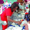 Hed: Sweetening up military life, 2015

Vicenza, Italy, June 19, 2015: First lady Michelle Obama serves ice cream to children of servicemembers during an event in support of military families, offering up some caramel sauce as a topping. 

Did you know July is National Ice Cream month? So go ahead and sweeten up your life a bit with a scoop or two! And add some caramel sauce (and sprinkles!) while you're at it, we recommend. 

META TAGS: First Lady; military family; military life; U.S. Army; Blue Star Families