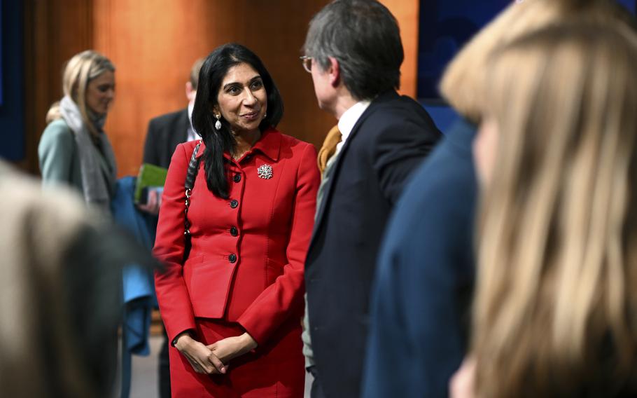 Britain’s Home Secretary Suella Braverman speaks with members of the media after a press conference following the launch of new legislation on migrant channel crossings at Downing Street, London, Tuesday, March 7, 2023. The U.K. government says it’s ready for legal challenges to a tough new law intended to stop tens of thousands of migrants a year reaching the country in small boats across the English Channel.