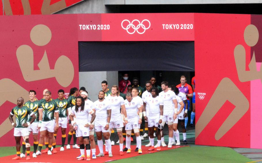 The U.S. Eagles and the South African Blitzboks prepare to enter Tokyo Stadium for an Olympic rugby sevens clash, Tuesday, July 27, 2021. 