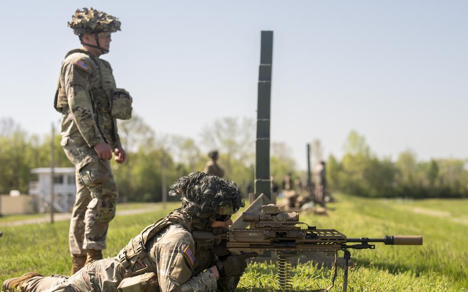 A 101st Airborne Division soldier fires the XM250 automatic weapon during training at Fort Campbell, Ky., on Monday, April 15, 2024. 