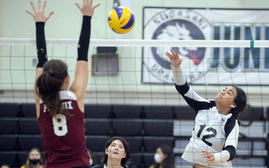 Zama's Kierstyn Aumua spikes against Seisen International's Lisa Purcell during Thursday's pool-play match in the Ryukyu Island Tournament. The Phoenix won in straight sets.