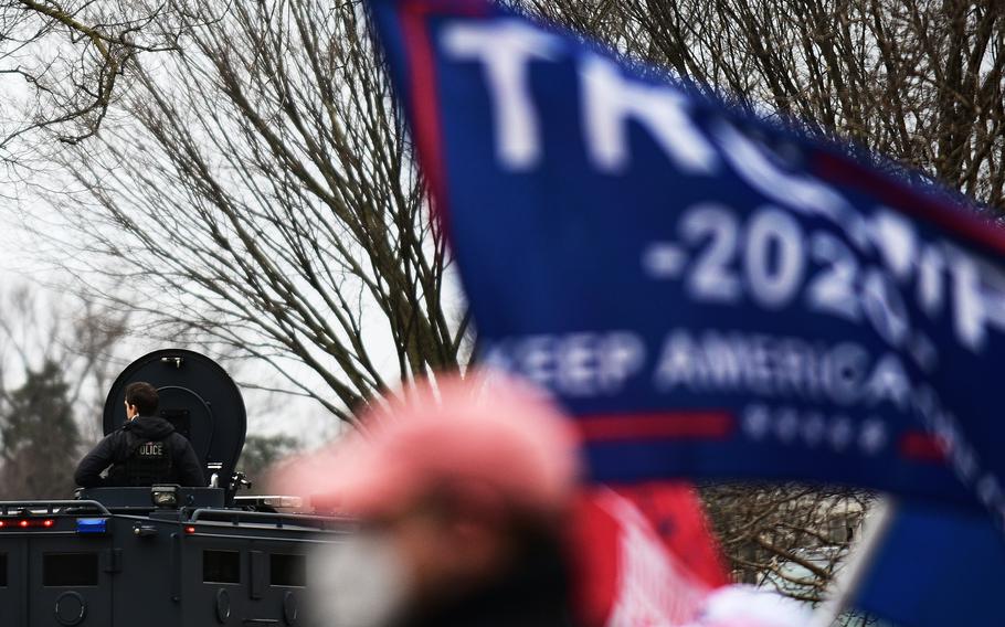 Secret Service agents protect an area around the White House where thousands of supporters of former president Donald Trump gathered in Washington, D.C., on Jan. 6, 2021. 