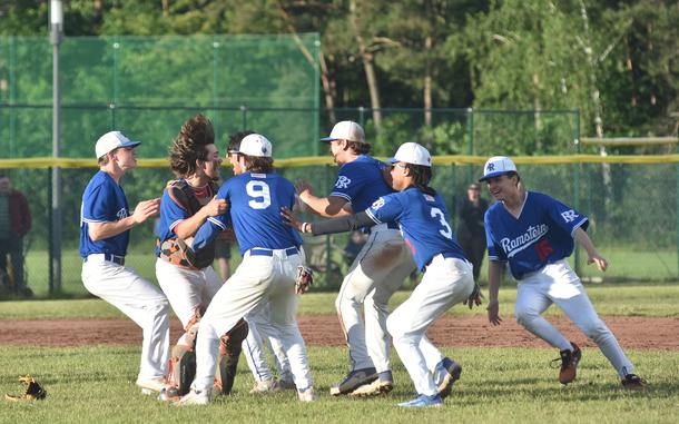 The Ramstein Royals celebrate winning the DODEA European Division I baseball championship Friday, May 24, 2024, at Ramstein Air Base, Germany.