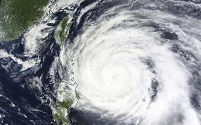 This Monday, May 29, 2023 satellite image released by NASA shows Typhoon Mawar approaching Philippines' northern provinces. 