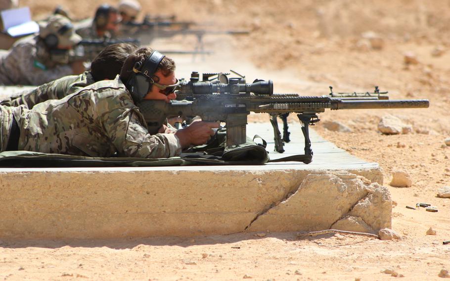 A U.S. Green Beret fires an M110 sniper rifle during Exercise Bright Star 2021 in September, at Mohamed Naguib Military Base, Egypt. U.S. Central Command has troops stationed or deployed from Egypt in the west to Kazakhstan in the east.