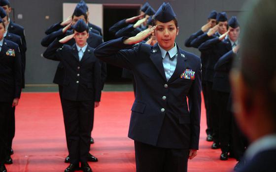Kaiserslautern, Germany, March 6, 2010: Aviano High School senior Melanie Vasquez requests permission to use the drill pad during the Regulation Drill competition at Kaiserslautern High School.

Read the story and check out additional photos here. [https://www.stripes.com/special-reports/jrotc-helps-seniors-prepare-for-next-step-1.105820]

META TAGS: ROTC; Reserve Officer Training Corps; DODEA; DODDS; military education