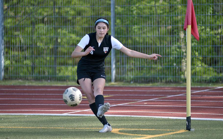 Stuttgart freshman Sienna Ingle sends in a cross during a match April 27, 2024, against Ramstein at Stuttgart High School in Böblingen, Gemany.
