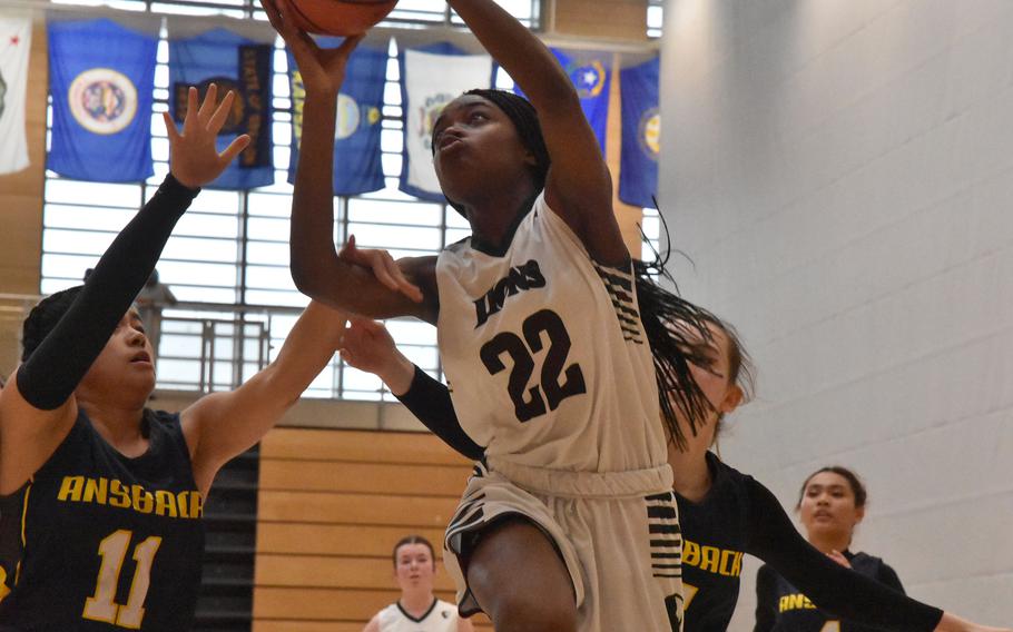 AFNORTH’s Makayla McNeill-Mark puts up a shot against Ansbach at the DODEA European Basketball Championships at Wiesbaden, Germany, on Thursday, Feb. 15, 2024.