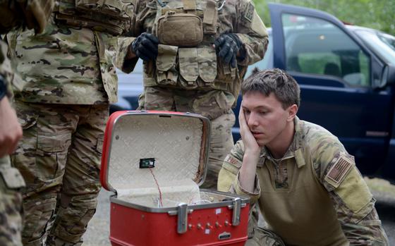 Staff Sgt. David Dezwaan, 60th Civil Engineer Squadron explosive ordnance disposal technician, inspects the wiring of a simulated radioactive dispersal device during an exercise May 5, 2016, at Clear Lake, California. Dezwaan and other EOD technicians eliminated the threat of numerous improvised explosive devices and the radioactive dispersal device during Operation: Half-Life, an exercise designed to evaluate a synchronized, multi-agency response to a crisis-situation. (U.S. Air Force photo by Senior Airman Bobby Cummings)