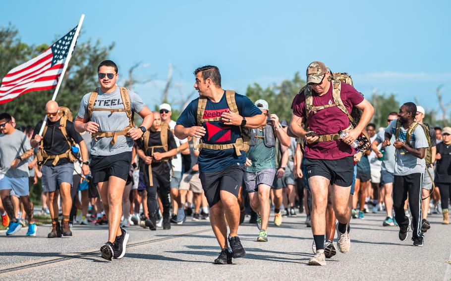 Airmen doing a three mile ruck.