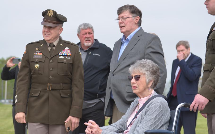 Brig. Gen. Geoffrey Norman, director of the Next Generation Comat Vehicle Cross Functional Team, speaks with Darrell and Rose Hirsch, the nephew and sister of Pvt. Robert D. Booker, Thursday, April 18, 2024, at a dedication ceremony at Aberdeen Proving Ground, Md., for the service’s new combat vehicle, the M10 Booker. 