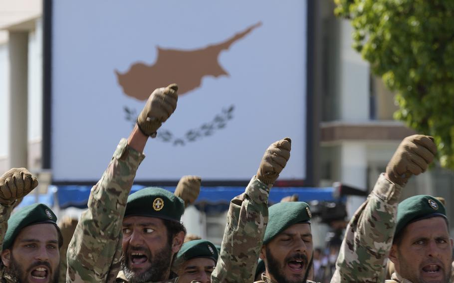 Cypriots reservist of special forces march during a military parade marking the 62nd anniversary of Cyprus’ independence from British colonial rule, in Nicosia, Cyprus, Saturday, Oct. 1, 2022. Cyprus gained independence from Britain in 1960 but was split along ethnic lines 14 years later when Turkey invaded following a coup aimed at uniting the island with Greece.