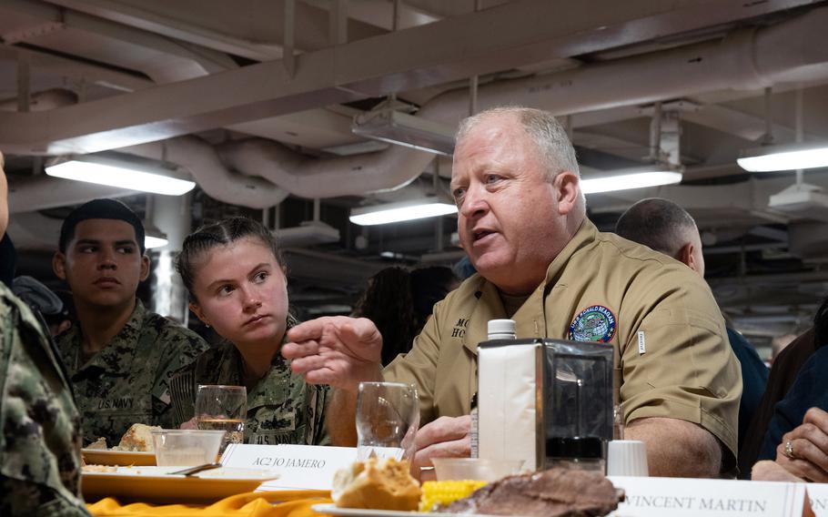 Master Chief Petty Officer of the Navy James Honea celebrates Thanksgiving with sailors aboard the USS Ronald Reagan at Yokosuka Naval Base, Japan, Thursday, Nov. 23, 2023.