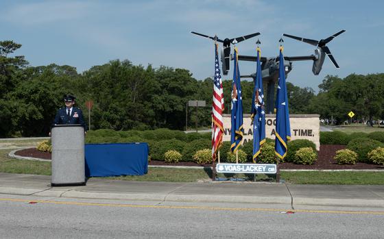 U.S Air Force Lt. Col. John Campion, executive officer for U.S. Air Force Lt. Gen. Tony Bauernfeind, prepares to begin a Distinguished Flying Cross ceremony at Voas-Lackey Roundabout, Hurlburt Field, Fla. , May 16, 2024. U.S. Air Force Maj. Randell Voas, a CV-22B Osprey pilot, and Senior Master Sgt. James Lackey, a CV-22B flight engineer, were awarded the DFC for actions taken during a combat mission near Qalat, Afghanista, April 9, 2010. 