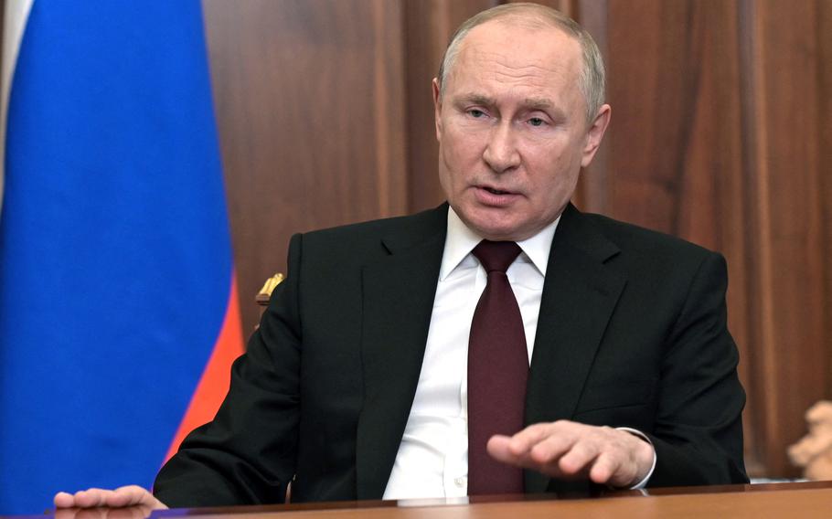 Russian President Vladimir Putin speaks during his address to the nation at the Kremlin in Moscow on Feb. 21, 2022.