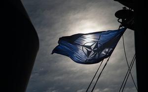220129-N-GP384-1844 MEDITERRANEAN SEA (Jan. 29, 2022) The NATO flag flies aboard the Nimitz-class aircraft carrier USS Harry S. Truman (CVN 75) in support of Neptune Strike 2022, Jan. 29, 2022. Neptune Strike 2022 highlights the natural evolution of NATO's ability to integrate the high-end maritime warfare capabilities of a carrier strike group to support the defense of the Alliance. (U.S. Navy photo by Mass Communication Specialist Seaman Jack Hoppe)