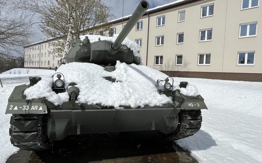 Snow melts from the armor at a display on the U.S. Army base in Sembach, Germany, April 9, 2022. The area was blanketed by several inches of snow overnight, causing widespread road closures and numerous downed trees.