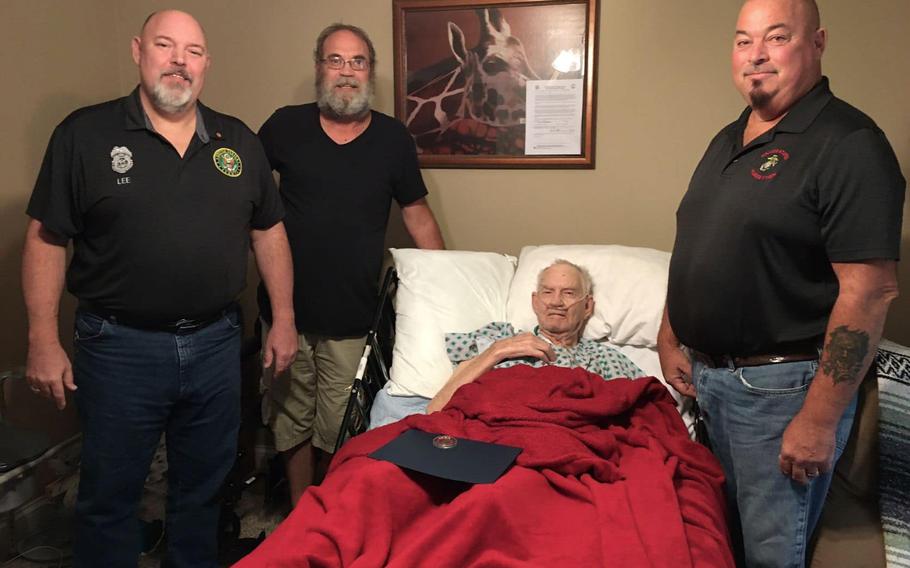 U.S. Army veteran Joseph W. Fulkerson receives a flag-pinning ceremony for his military service at Hospice and Palliative Care of Western Kentucky.