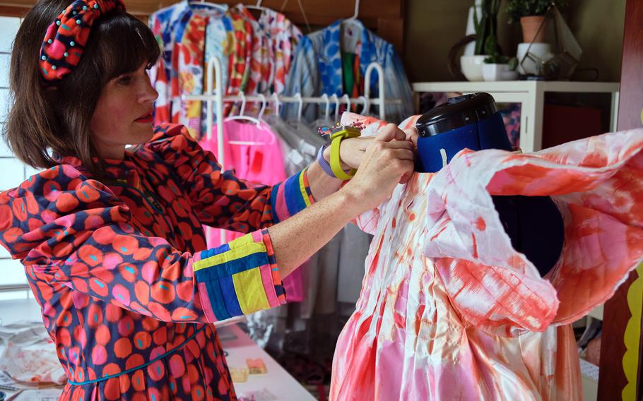 Navy spouse Katie Kortman shows off her home design studio at Yokosuka Naval Base, Japan, Sept. 30, 2021. She is a contestant on the upcoming season of Bravo's fashion competition series "Project Runway."