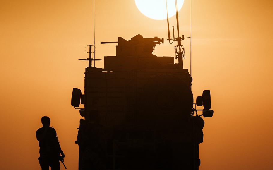 Syrian Democratic Forces conduct a patrol during a joint operation with U.S. soldiers in Syria in May 2021. Seven years after the Islamic State group swept through parts of Syria and Iraq, ISIS it remains a threat, but hasn’t been able to mount any deliberate attacks on coalition forces in more than two years, the U.S. military said.