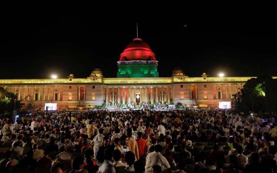 People attend India’s Prime Minister Narendra Modi’s swearing-in ceremony at the presidential palace in New Delhi on Sunday, June 9, 2024. 
