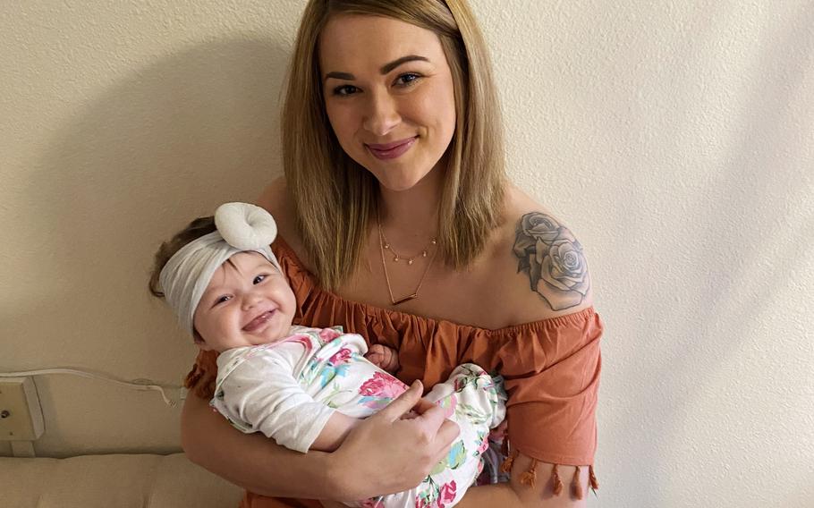 Katie Richard and her daughter, Scarlett Flores-Guerra, pose for a photo shortly before Scarlett’s death on April 18, 2020. 