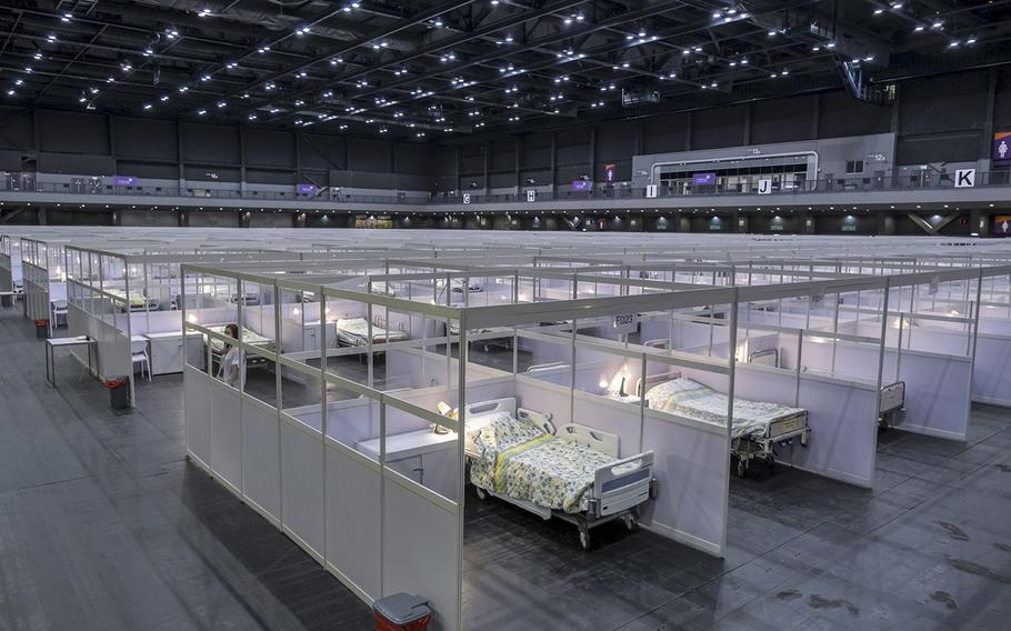 Beds and furniture sit inside cubicles in a quarantine facility at the AsiaWorld-Expo in Hong Kong on Aug. 1, 2020. 