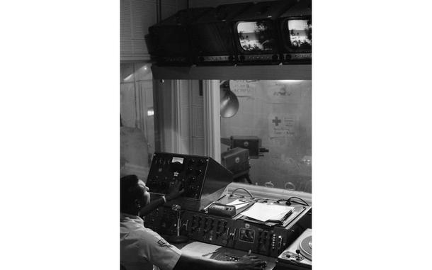 Incirlik Air Base, Turkey, July 7, 1964: A1C John F. Cody from Jacksonville, Fla., checks the program monitor in the control booth of the Armed Forces Radio-TV station at Adana, Turkey. Cody is in charge of radio and television production at the station. Nine AFTV servicemembers produce both the TV and radio broadcasts of the station. Even with limited  resources and space comprising of a small 15 by 20 foot studio, AFTV Incirlik Air Base in Turkey still manages to produce enough programming to fill their weekday 4 p.m. to midnight, and 12 to12 weekends timeslots with original programming. 

Looking for Stars and Stripes’ historic coverage? Subscribe to Stars and Stripes’ historic newspaper archive! We have digitized our 1948-1999 European and Pacific editions, as well as several of our WWII editions and made them available online through https://starsandstripes.newspaperarchive.com/

META TAGS: Europe; Asia; Eurasia; AFN; American Forces Network; television network; AFN personnel; entertainment; military; TV studio; broadcast; TV; television; TV show; journalism; community; Armed Forces Network; radio; African American